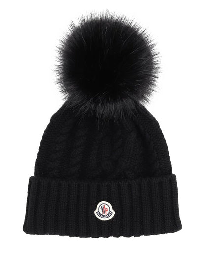 Moncler bonnet en maille torsadée à pompon