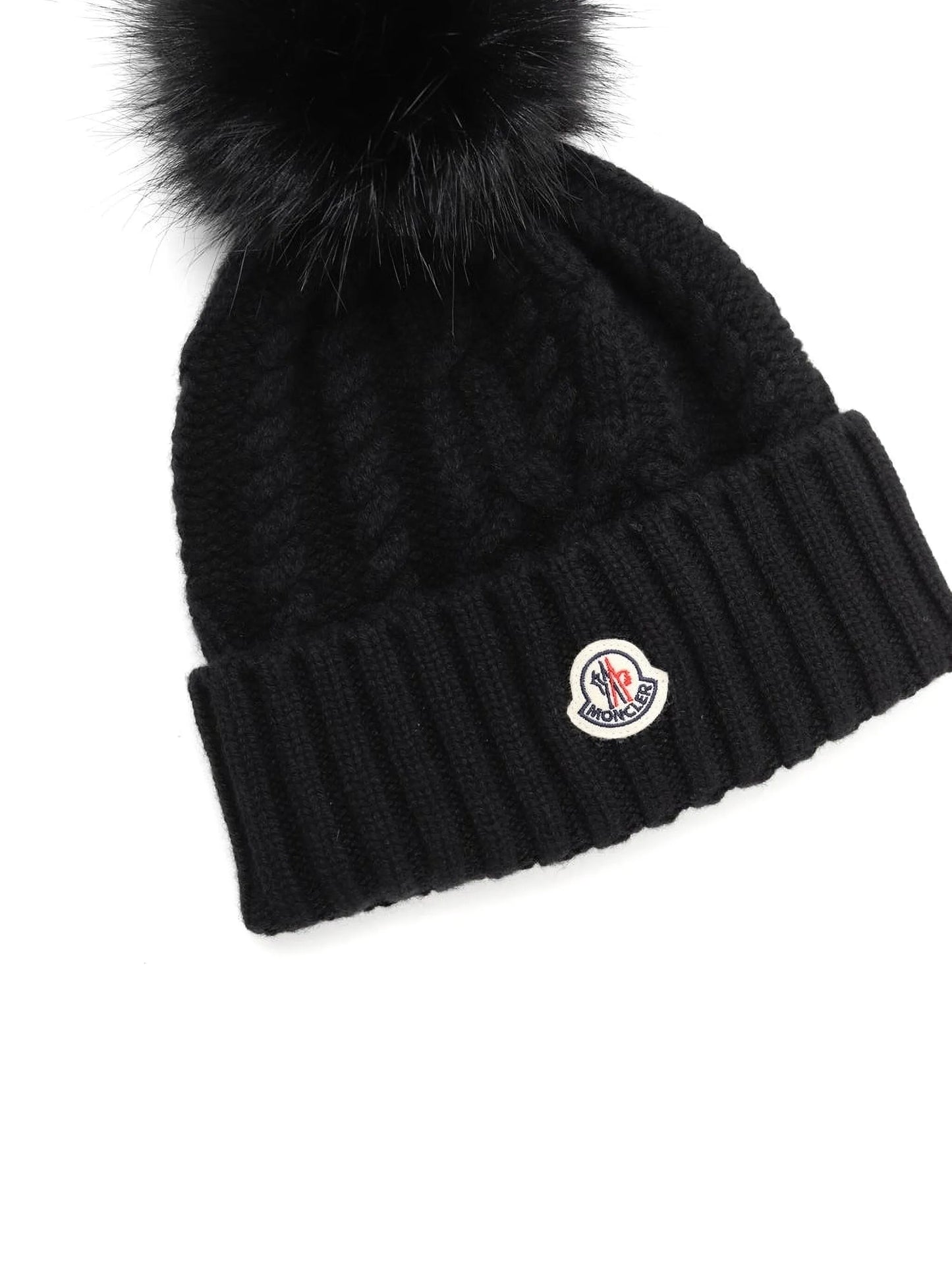 Moncler bonnet en maille torsadée à pompon